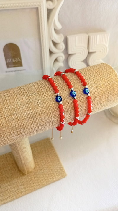 Pulsera de hilo • Cristal Rojo + Ojito 