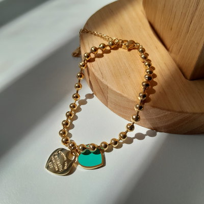 Pulsera Verde Élite Dorada 