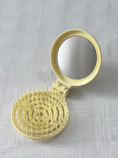 Espejo peine de cartera