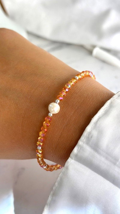 PULSERA CRISTALES C/PERLA CARAMEL