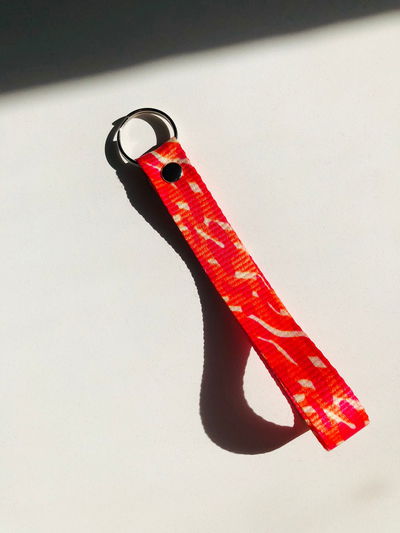 Llavero naranja y fucsia 