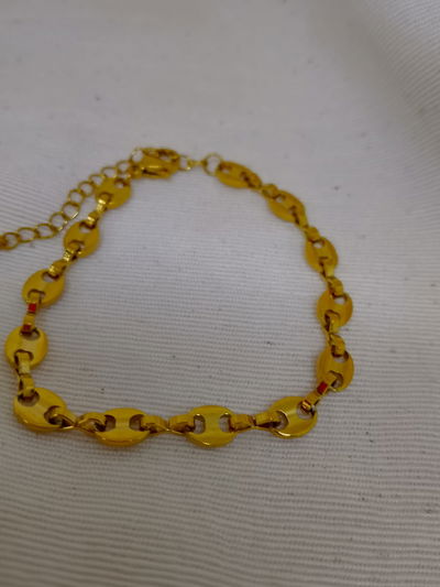PULSERA GAMA -  DE ACERO QUIRURGICO ENCHAPADO EN ORO 18K