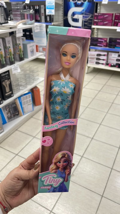 MUÑECA TINY