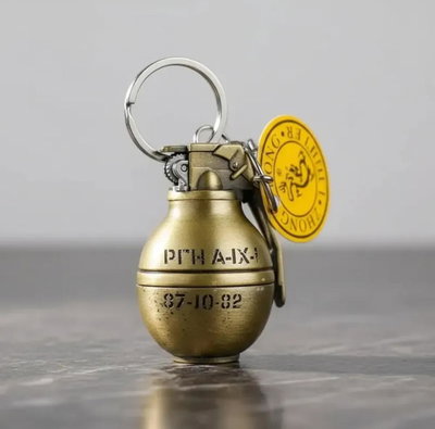 Encendedor Granada Dorada 87-10-82 – Estilo Vintage Metálico y Recargable