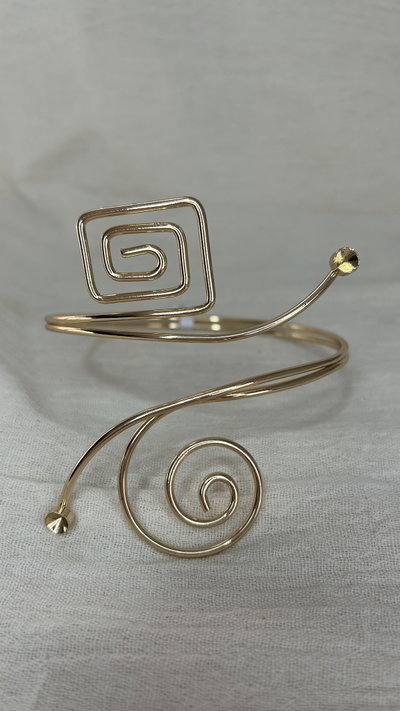 Brazalete Spiral Armor (regulable) - Acero Dorado 