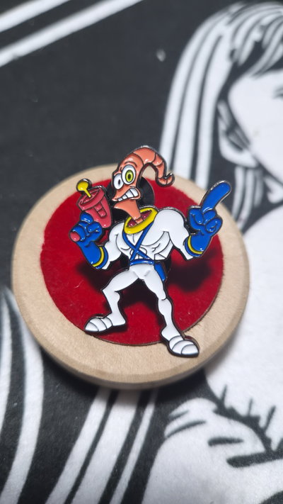Pin "JIM" - Earthwrom Jim