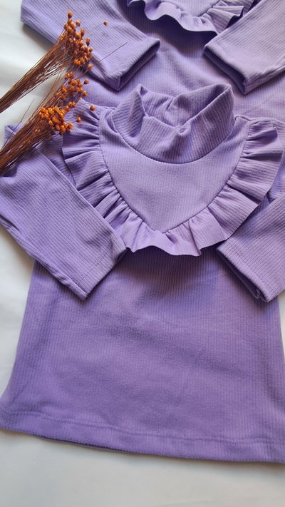POLERA CON VOLADOS 