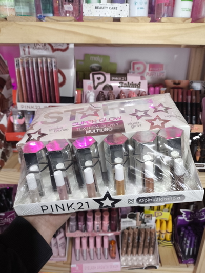 caja entera 24unidades iluminador líquido pink21