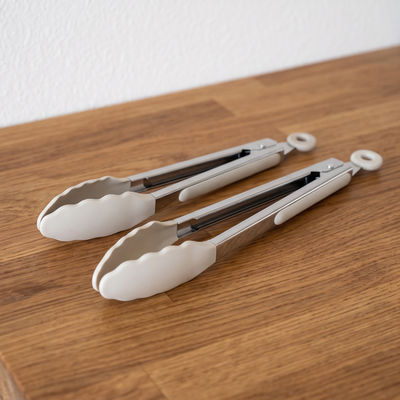 Set de 2 Pinzas de Acero Inoxidable Beige