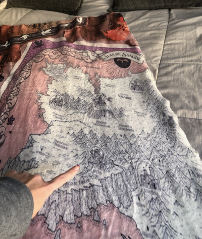 Pantuflas y manta de Alas de Sangre