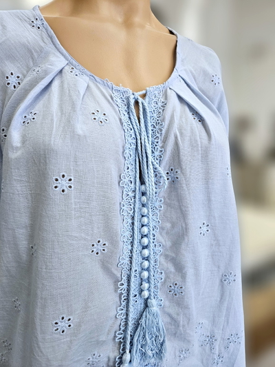 MD004 Blusa calada borlas