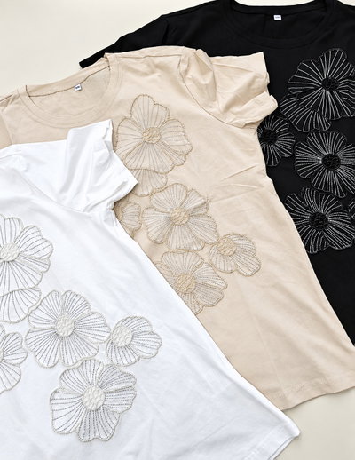 PT025 Remera flor mostacillas
