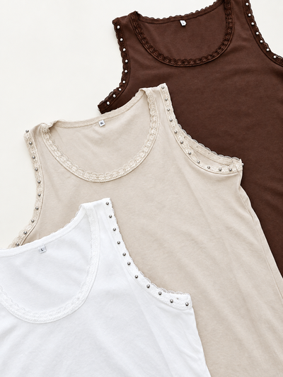 PT029 Musculosa puntilla tachas