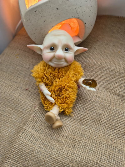 Duende bebé "ojo de tigre"