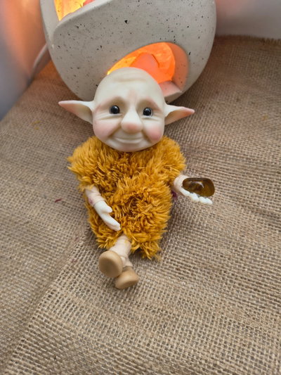 Duende bebé "ojo de tigre"