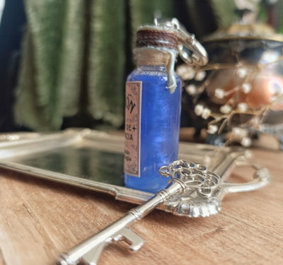 Charm Poción 