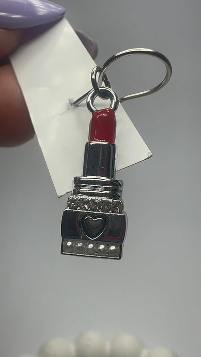 PRENDEDOR LABIAL