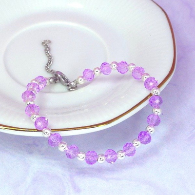 Pulsera Cristal de roca 6mm lila translucido