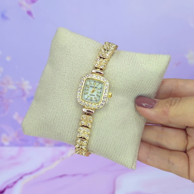 Reloj AURORA dorado