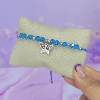 Pulsera regulable con dije acero cristales celestes