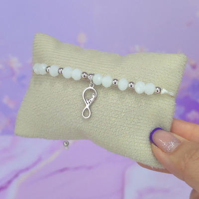 Pulsera regulable con dije acero cristales blancos