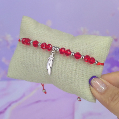 Pulsera regulable con dije acero cristales rojo