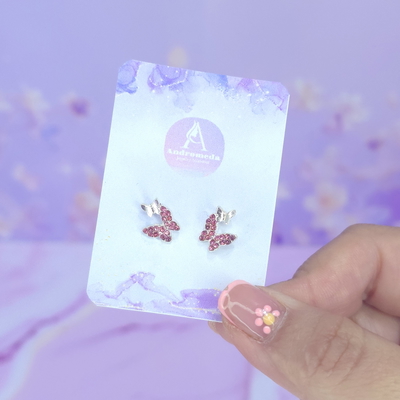 Aros pasante mini mariposa stras rosa AQ