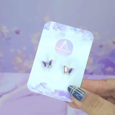 Aros pasante mariposas mini tornasol AD