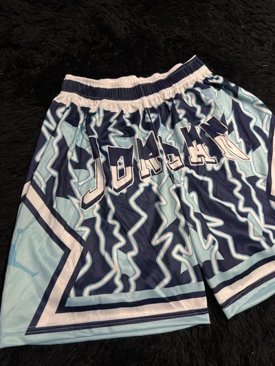 SHORT SUBLIMADO JORDAN ZIGZAG Celeste