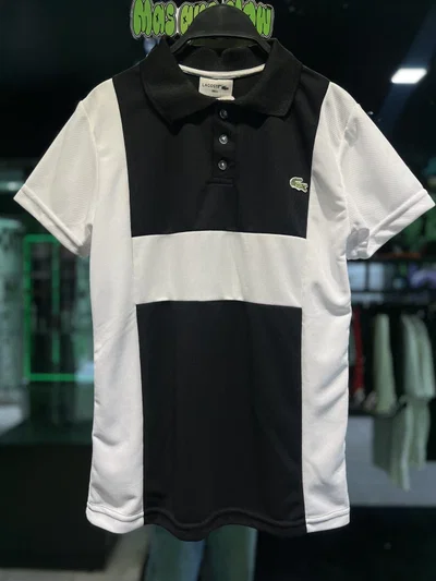 CHOMBA LACOSTE FRANJA Negra con blanco