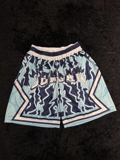 SHORT SUBLIMADO JORDAN ZIGZAG Celeste