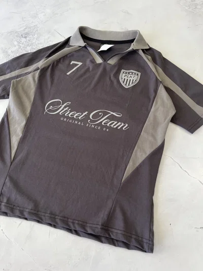 CHOMBA 7 PLKT GRIS OSCURO