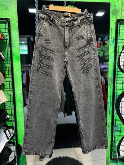 JEANS BAGGY TUNDER DESGASTADO Gris