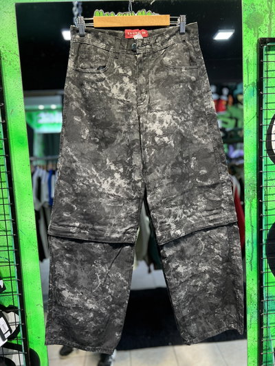 JEANS BAGGY DESMONTABLE MANCHAS Gris