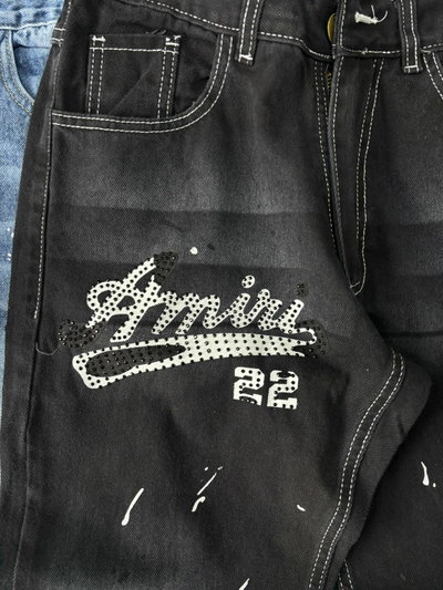 JEANS RECTO AMIRI MANCHAS Y STRASS Negro