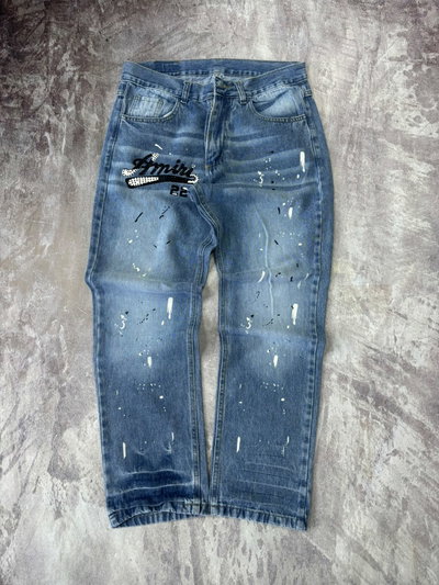 JEANS RECTO AMIRI MANCHAS Y STRASS Azul