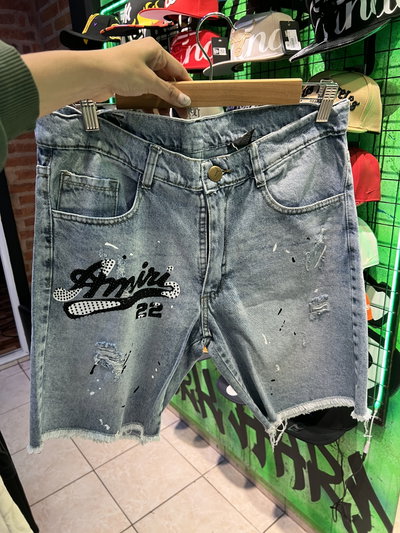 BERMUDA AMIRI MANCHAS Y STRASS CELESTE