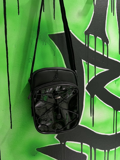 MORRAL JORDAN CON TIRAS CHAROL Negro