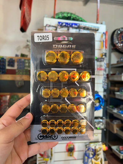 Cubre tornillos dorado