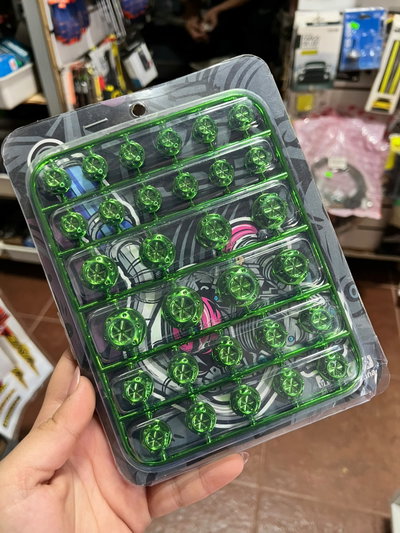 Cubre tornillos con diseño verde