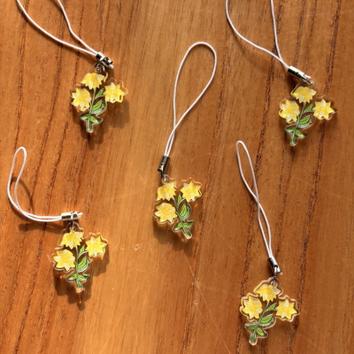 Charm flor amarilla
