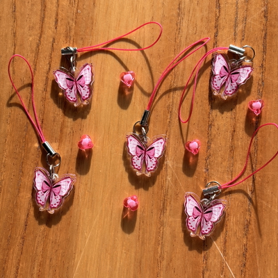 Charm mariposa rosa