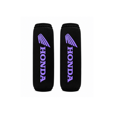 CUBREAMORTIGUADORES HONDA NEGRO / VIOLETA