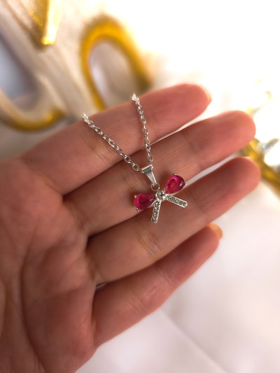 Cadena acero blanco con dije moño