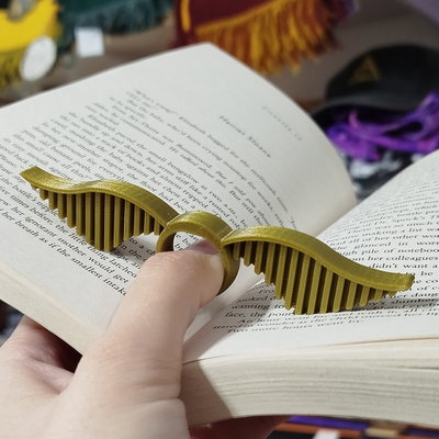 Sujeta Hojas Snitch