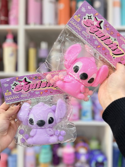 Squishy Stitch pastel con pompones importado