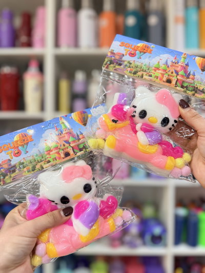 Squishy Hello Kitty con pompones importado