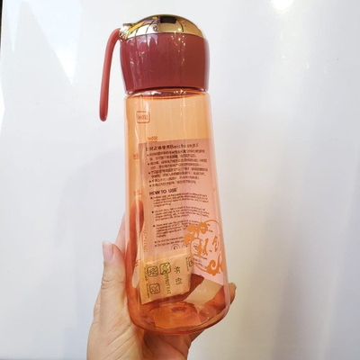 Botella urbana tapa dorada