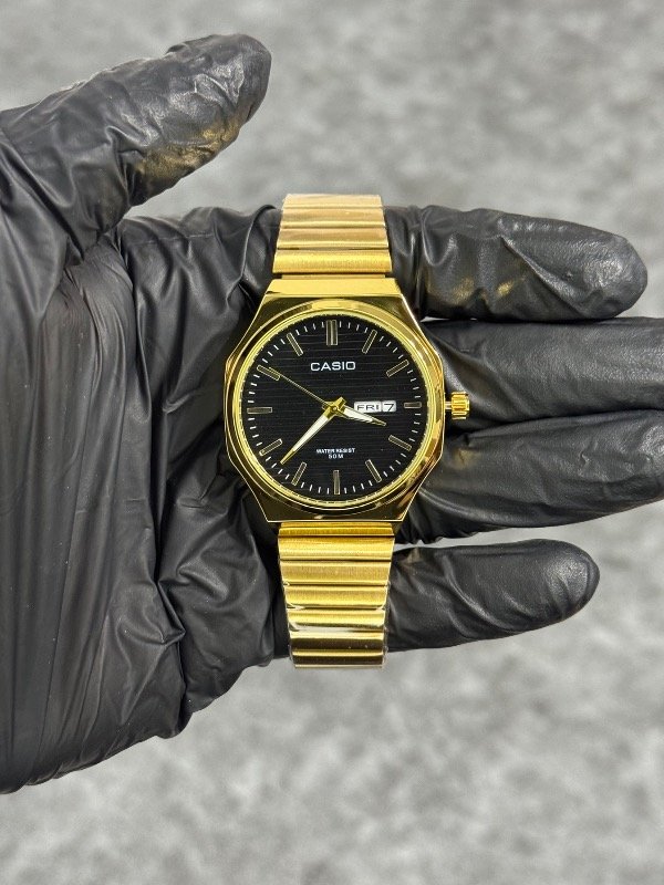 CASIO 13 ORO NEGRO (premium)