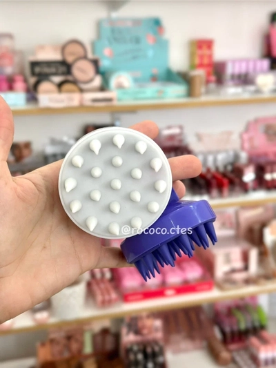 Masajeador capilar para ducha